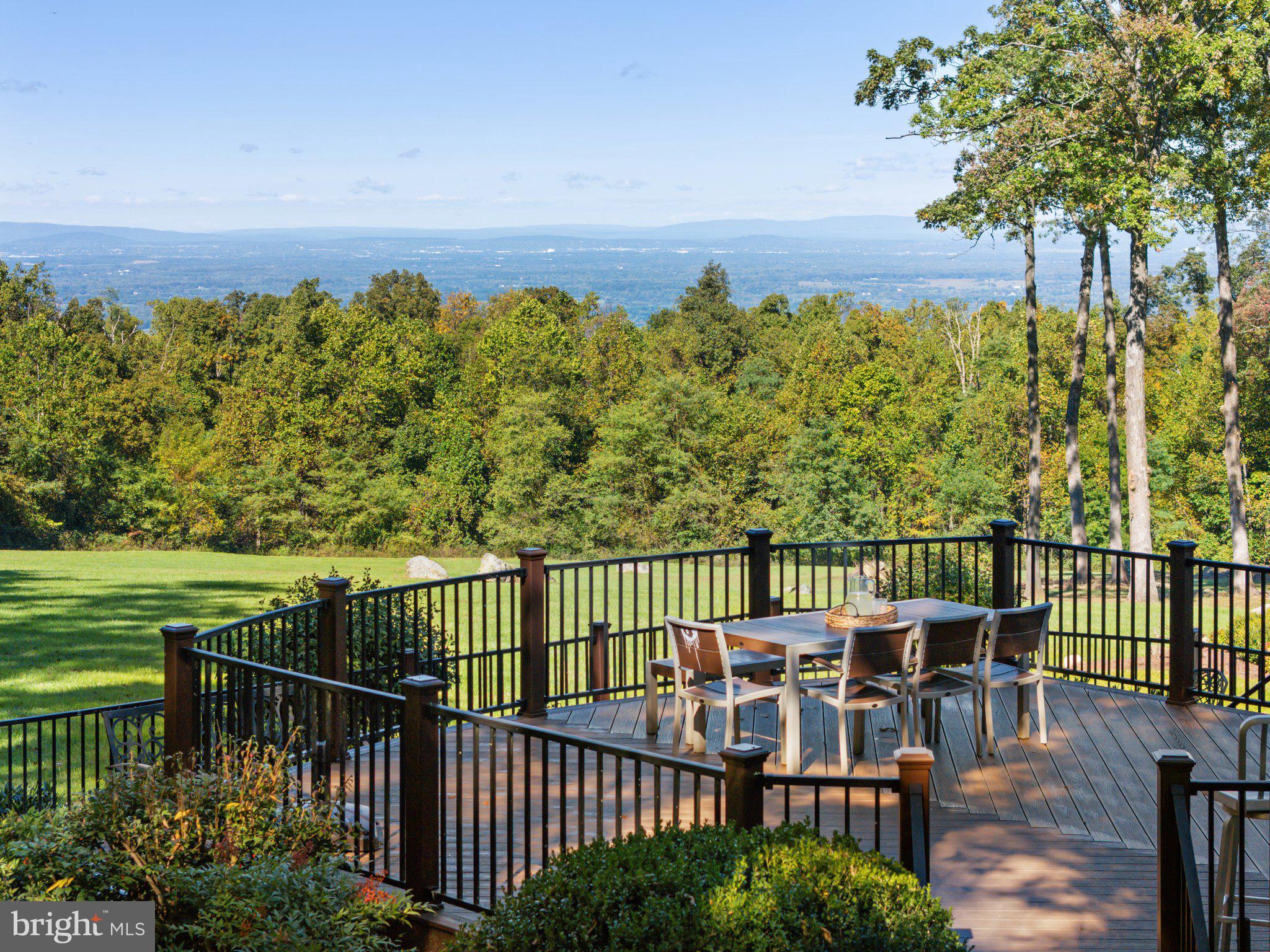 20615 Blue Ridge Mountain Road Paris, VA 20130 - Photo 41 of 80 a view of a balcony with wooden floor & fence