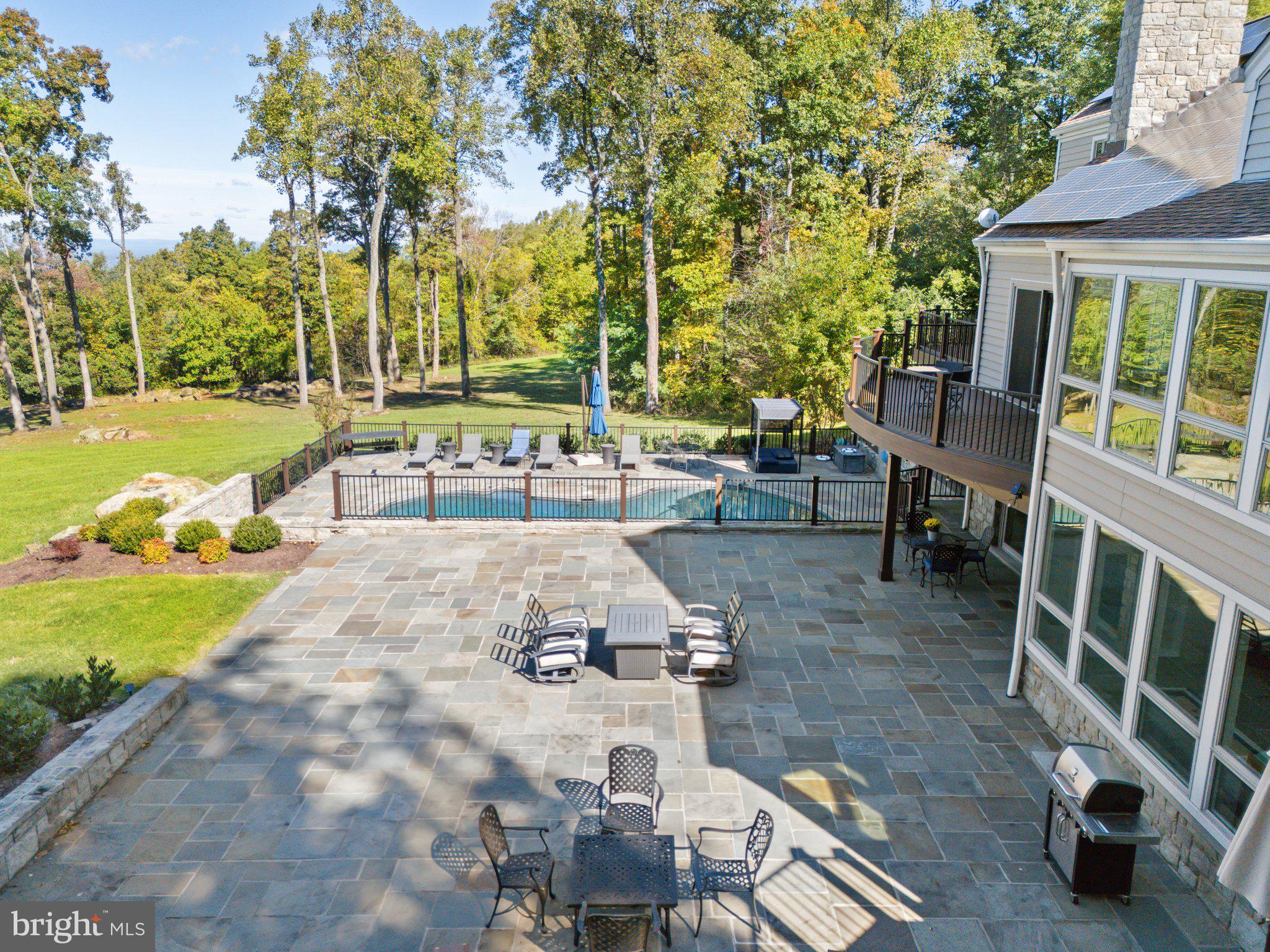 20615 Blue Ridge Mountain Road Paris, VA 20130 - Photo 43 of 80 a view of a swimming pool with a patio