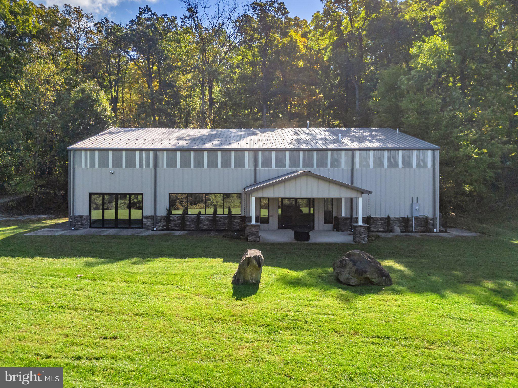 20615 Blue Ridge Mountain Road Paris, VA 20130 - Photo 50 of 80 a view of a house with swimming pool and sitting area