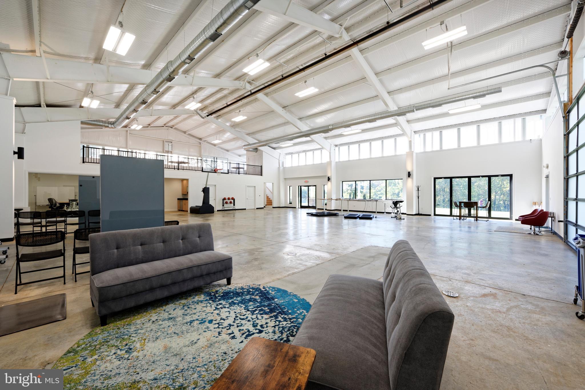 20615 Blue Ridge Mountain Road Paris, VA 20130 - Photo 54 of 80 a living room with furniture and a view of kitchen