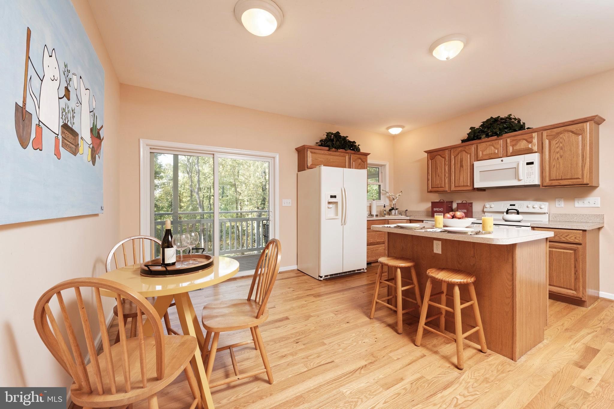 20615 Blue Ridge Mountain Road Paris, VA 20130 - Photo 68 of 80 a dining room with furniture and a floor to ceiling window