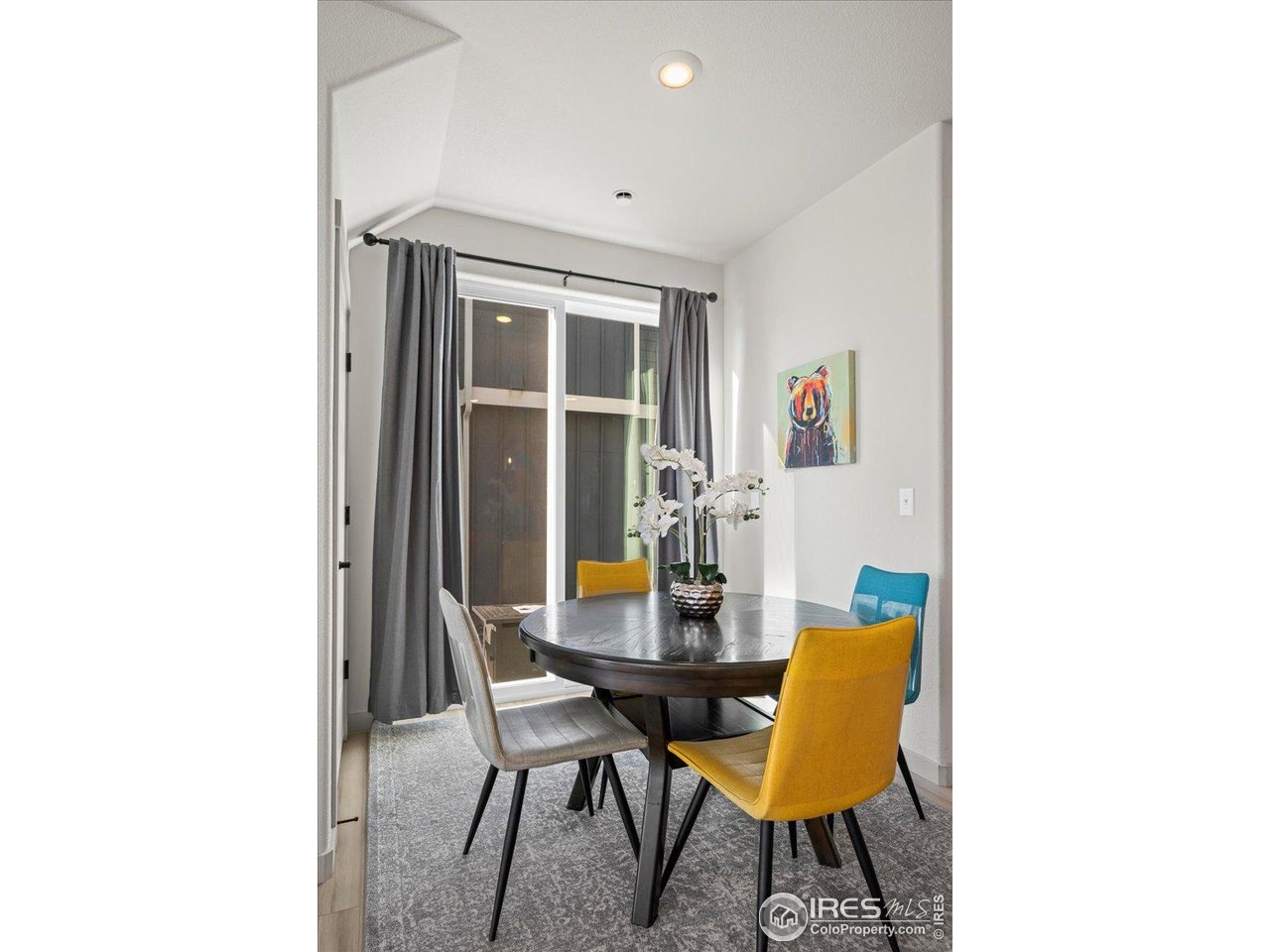 1088 Blue Bell Road Berthoud, CO 80513 - Photo 11 of 33 a view of a dining room with furniture and window