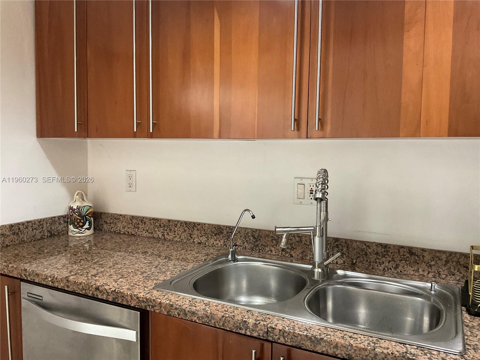 2485 Inagua Avenue Miami, FL 33133 - Photo 11 of 17 a close view of sink and tap