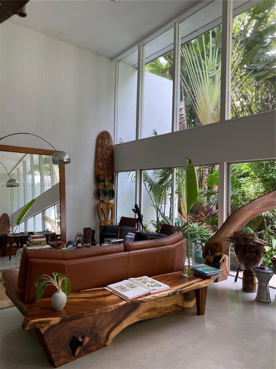 2485 Inagua Avenue Miami, FL 33133 - Photo 6 of 17 a room with car parked