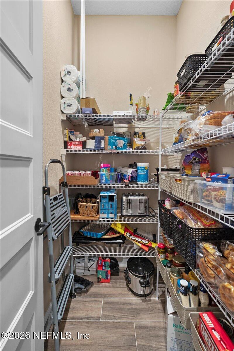 11098 Engineering Way Jacksonville, FL 32256 - Photo 13 of 62 a room with storage and utility