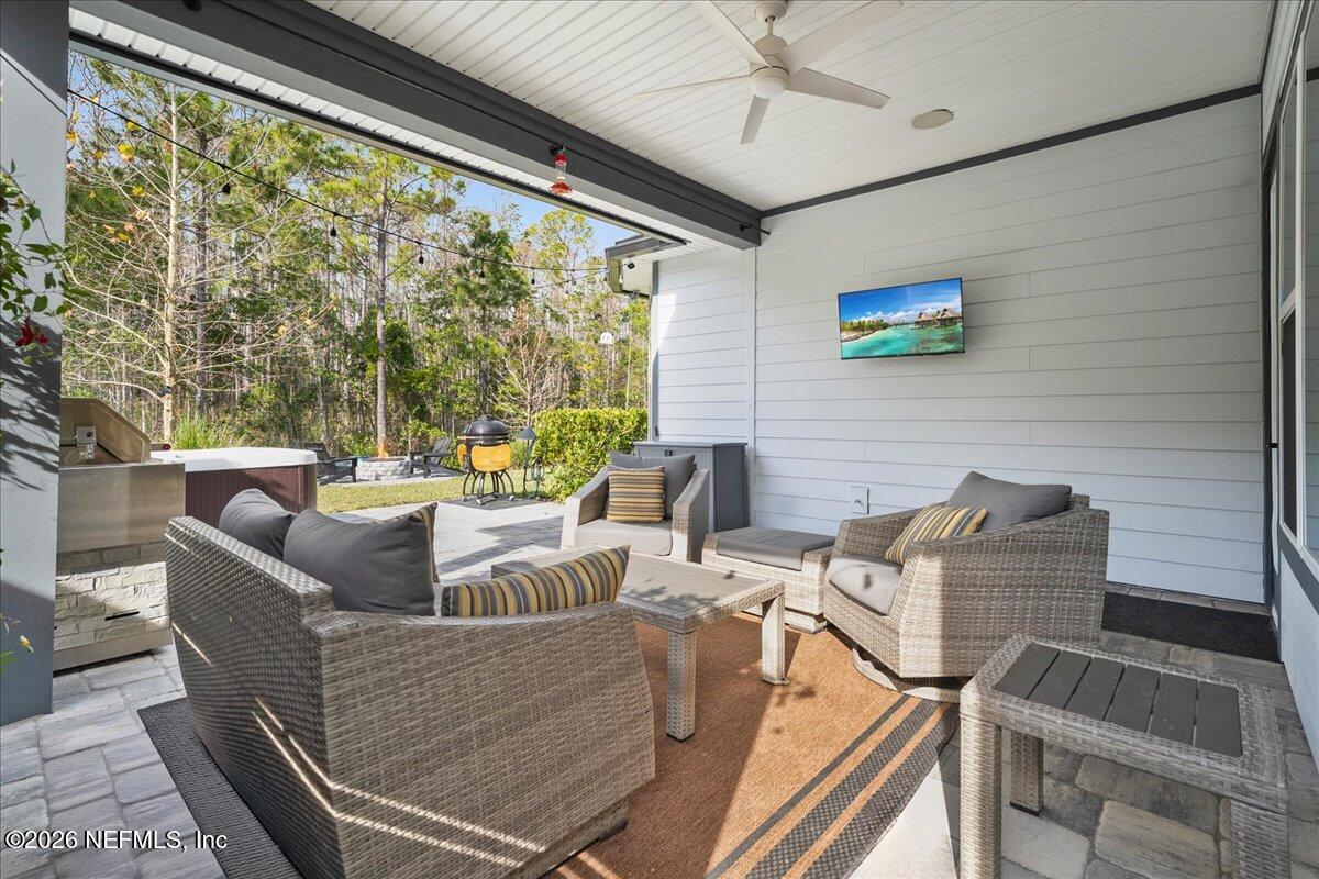 11098 Engineering Way Jacksonville, FL 32256 - Photo 32 of 62 a living room with furniture and a large window