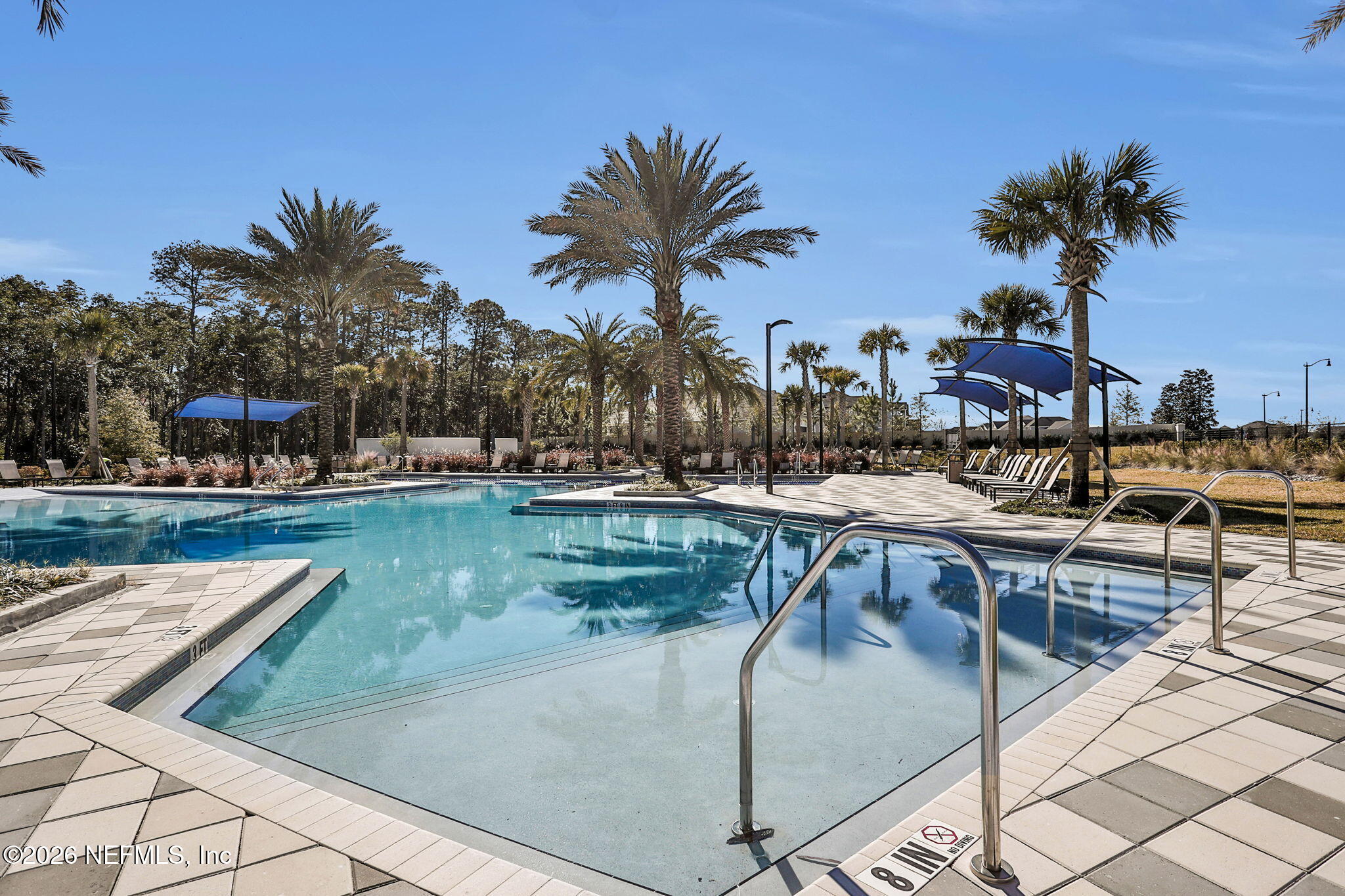 11098 Engineering Way Jacksonville, FL 32256 - Photo 50 of 62 a view of a swimming pool with chairs