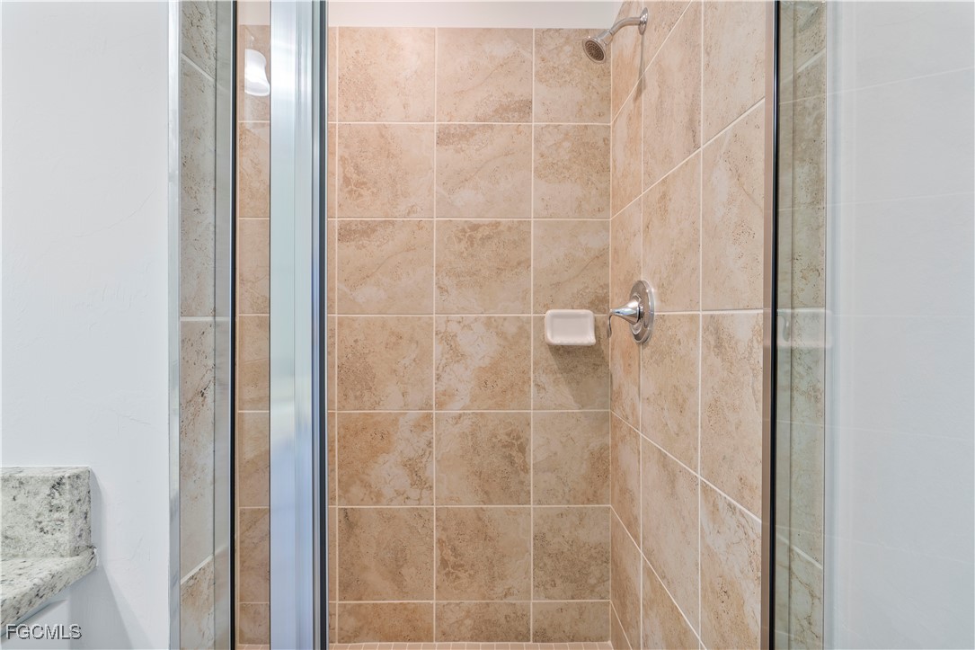 43977 Boardwalk Loop, Unit 2338 Punta Gorda, FL 33982 - Photo 17 of 50 a bathroom with a shower