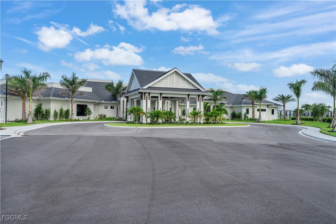 43977 Boardwalk Loop, Unit 2338 Punta Gorda, FL 33982 - Photo 22 of 50 a front view of a house with a garden