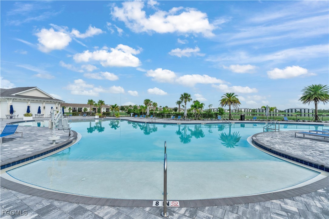 43977 Boardwalk Loop, Unit 2338 Punta Gorda, FL 33982 - Photo 40 of 50 a view of a lake with a yard