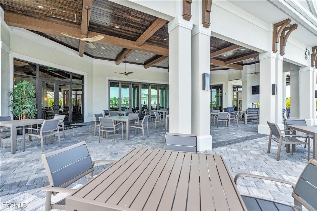 43977 Boardwalk Loop, Unit 2338 Punta Gorda, FL 33982 - Photo 42 of 50 a view of a dining room with furniture window and wooden floor
