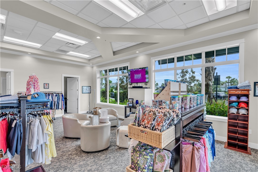 43977 Boardwalk Loop, Unit 2338 Punta Gorda, FL 33982 - Photo 48 of 50 a living room with furniture and a flat screen tv