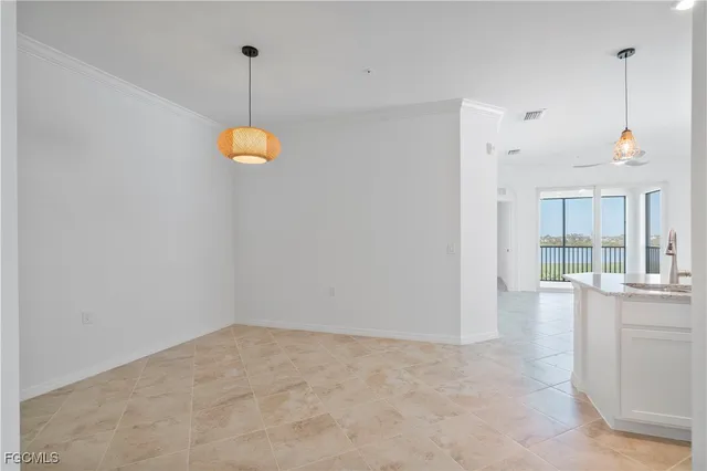 a view of a kitchen with a sink