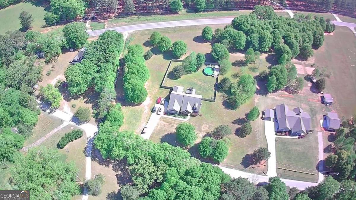 457 Old Good Hope Road Good Hope, GA 30641 - Photo 55 of 59 an aerial view of a house with yard swimming pool and outdoor seating