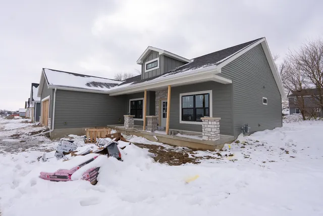 a view of a lounge chair on the front of house