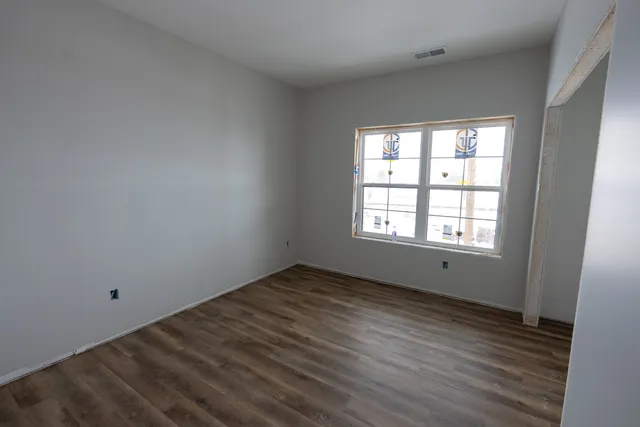 an empty room with windows