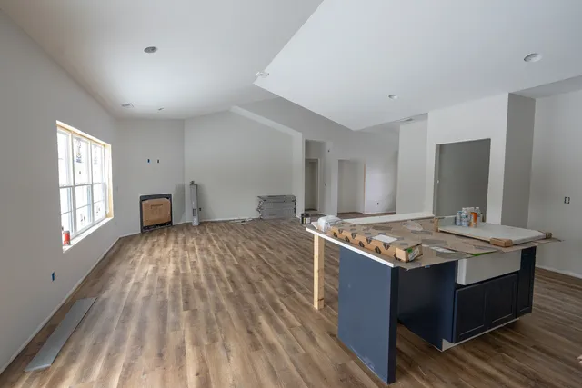 a kitchen with a stove and a sink