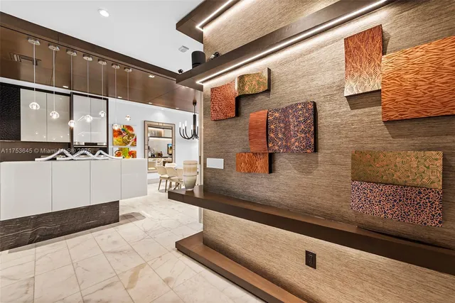 a bathroom with a sink a mirror and a shower