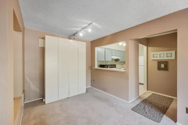 a view of a kitchen and a window