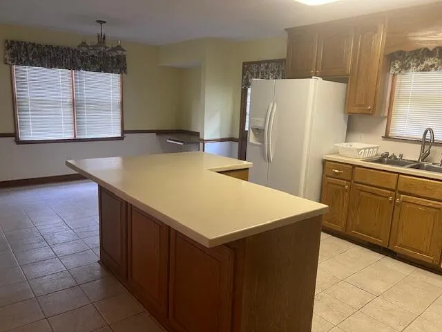 a kitchen with a cabinets and appliances