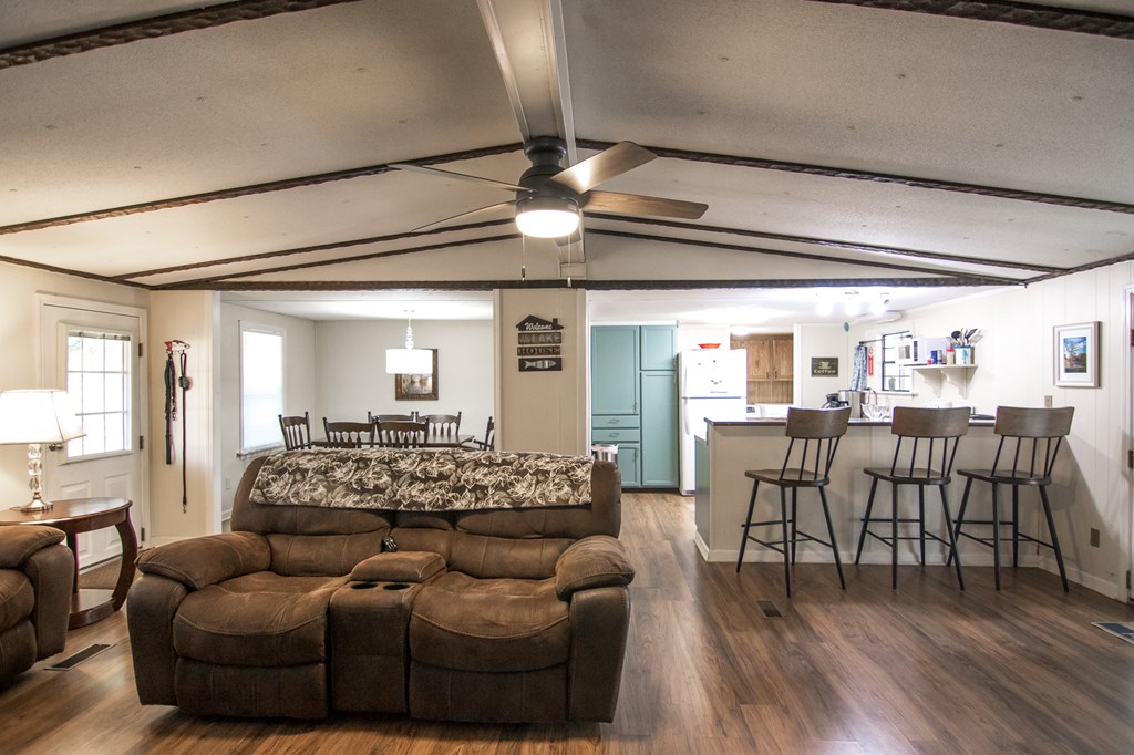1631 West Pine Lake Drive West Point, GA 31833 - Photo 12 of 37 a living room with furniture and wooden floor