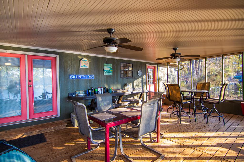 1631 West Pine Lake Drive West Point, GA 31833 - Photo 28 of 37 a view of a dining room with furniture window and outside view