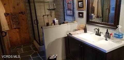 8787 Happy Road Moorpark, CA 93021 - Photo 6 of 7 a bathroom with a sink vanity and a mirror
