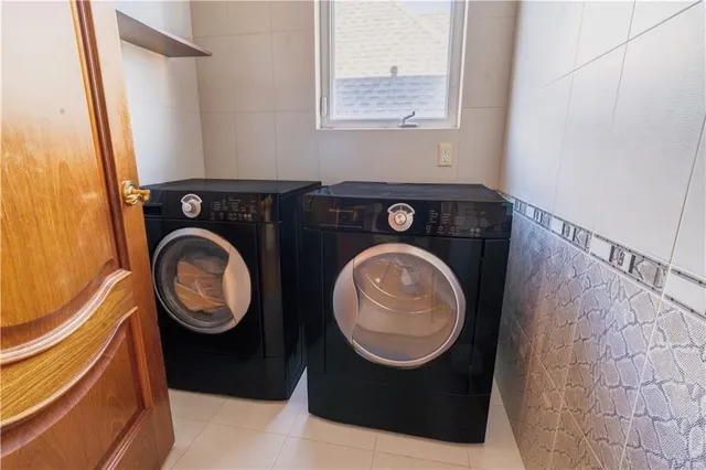 a view of a swimming pool and an outdoor seating