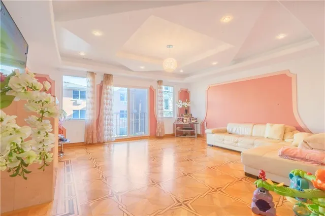 a spacious bedroom with a bed and a couch