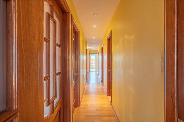 a view of hallway with shower and a yard