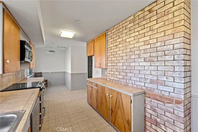 a view of room with window and sitting area