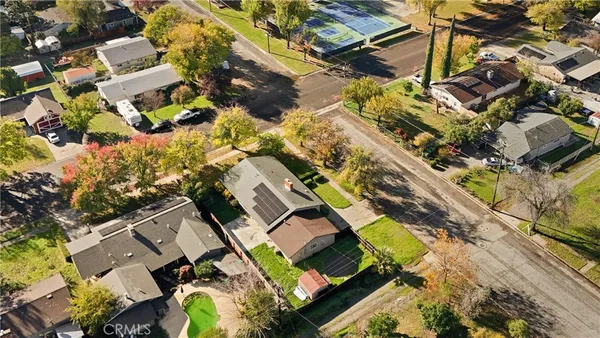 an aerial view of residential building and ocean view