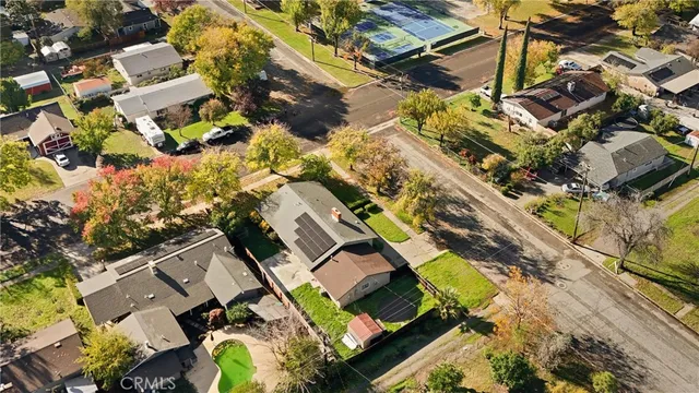 an aerial view of residential building and ocean view