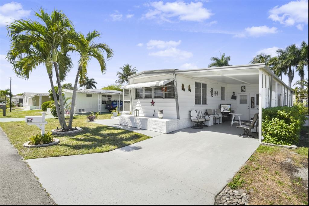 2001 Southwest 84th Avenue Davie, FL 33324 - Photo 11 of 38 a view of a house with backyard and sitting area