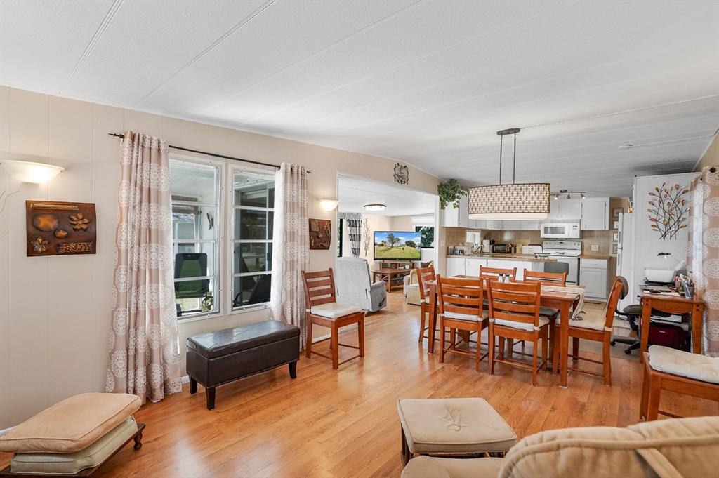 2001 Southwest 84th Avenue Davie, FL 33324 - Photo 20 of 38 a living room with furniture kitchen view and a large window