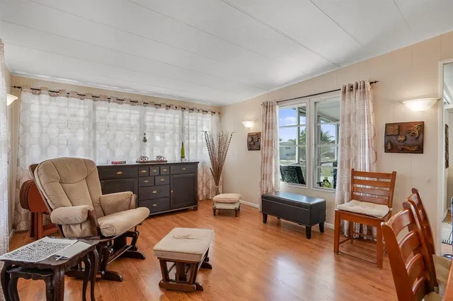 a living room with furniture and a window