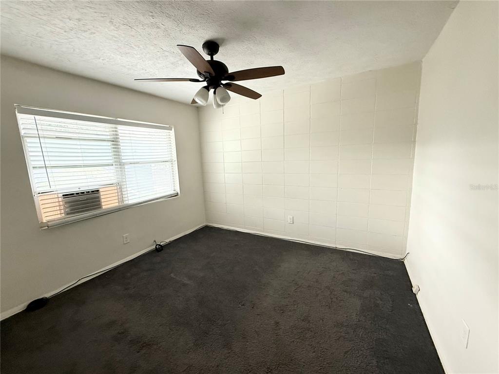 639 Ramona Lane, Unit 6 Orlando, FL 32805 - Photo 12 of 18 an empty room with a window