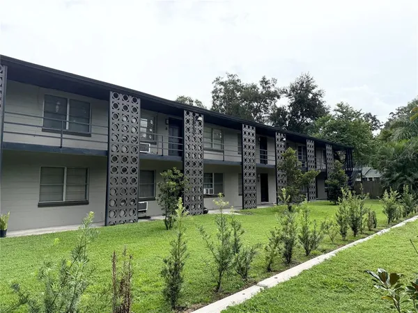 a view of a house with a garage