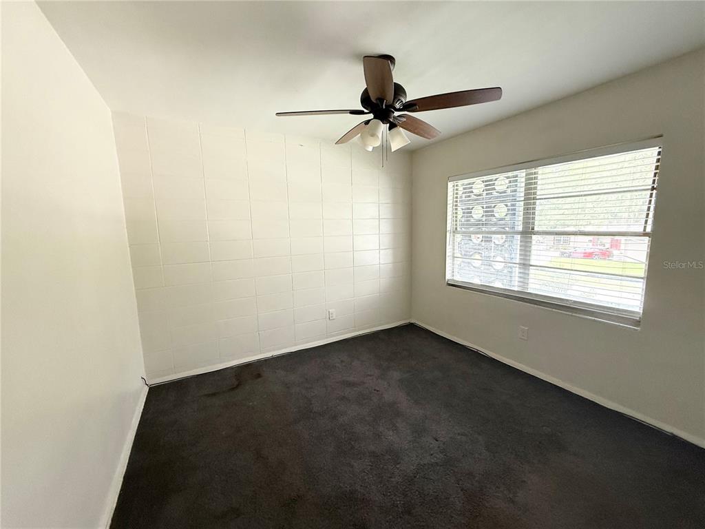 639 Ramona Lane, Unit 6 Orlando, FL 32805 - Photo 8 of 18 an empty room with a window