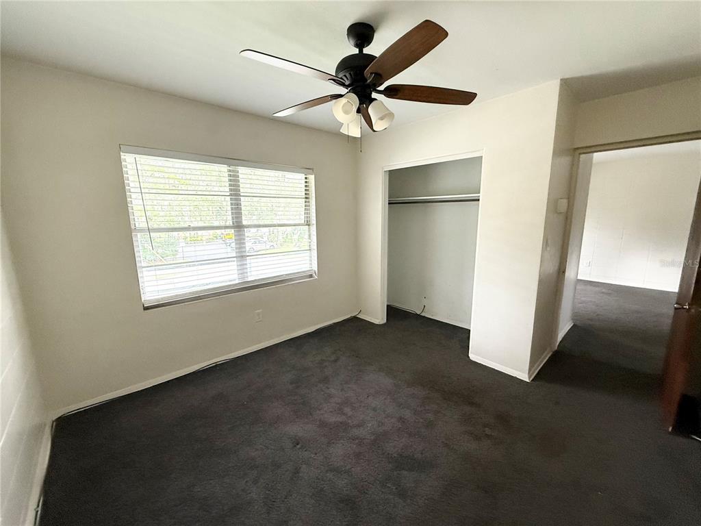 639 Ramona Lane, Unit 6 Orlando, FL 32805 - Photo 9 of 18 a view of an empty room with a window