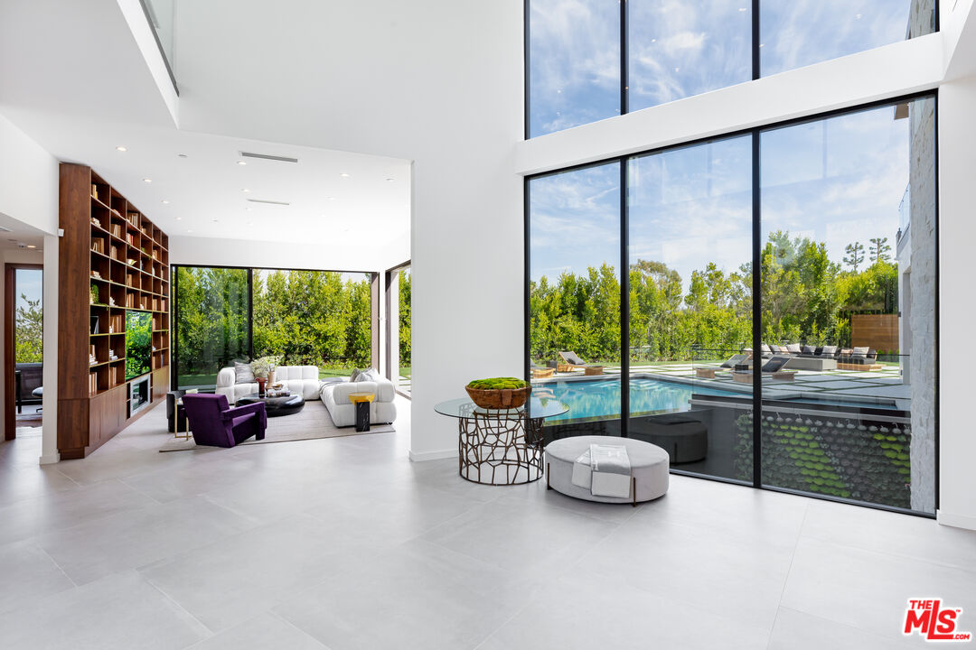 1523 Stradella Road Los Angeles, CA 90077 - Photo 16 of 54 a lobby with furniture and garden view