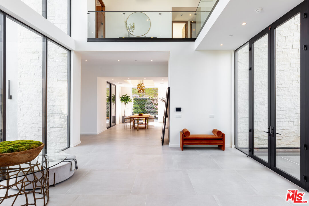 1523 Stradella Road Los Angeles, CA 90077 - Photo 22 of 54 a view of a livingroom with furniture and entryway