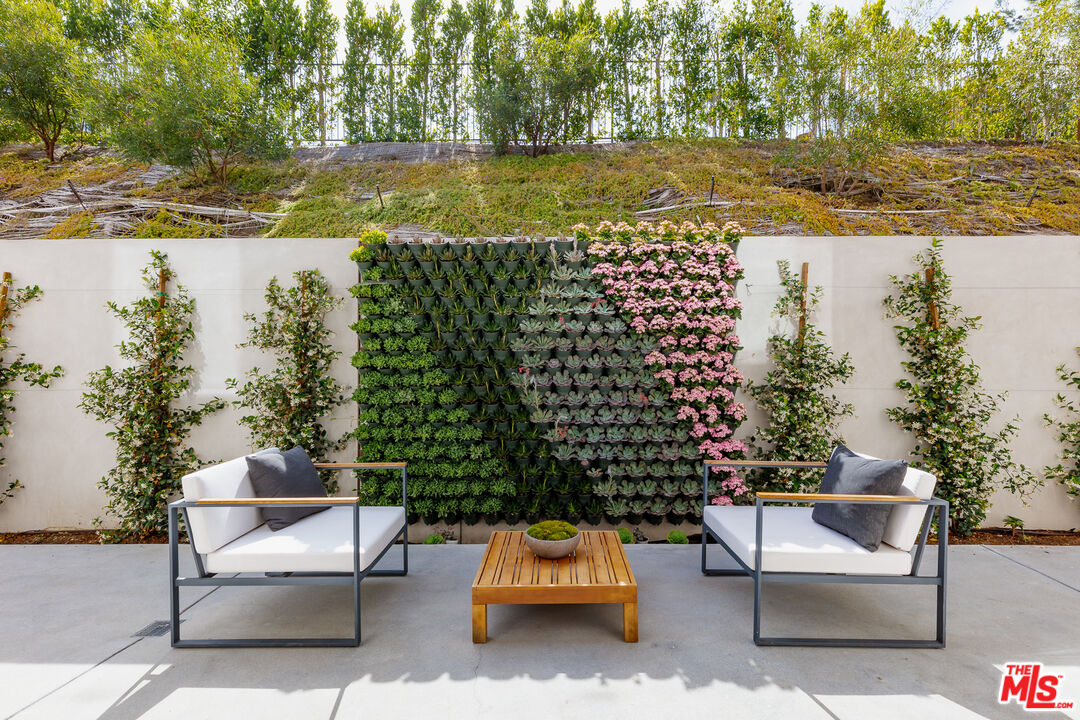 1523 Stradella Road Los Angeles, CA 90077 - Photo 25 of 54 a car parked on the side of a lake