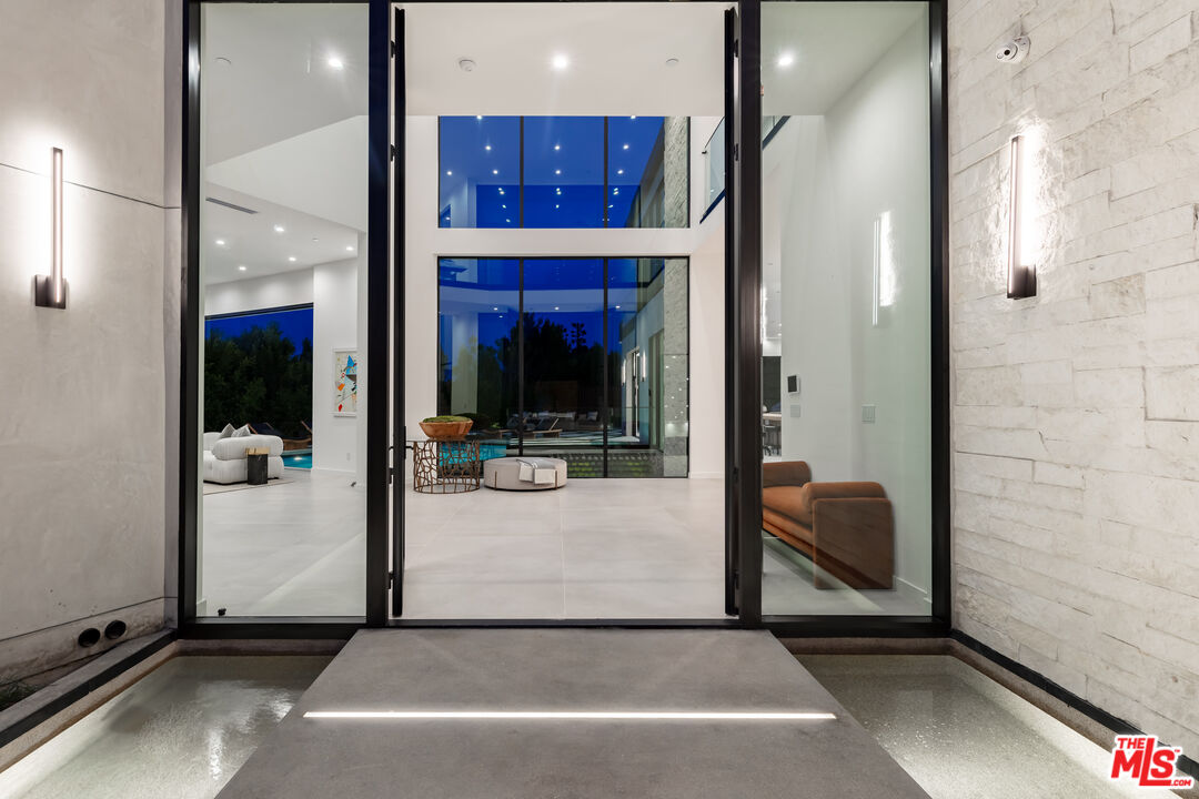 1523 Stradella Road Los Angeles, CA 90077 - Photo 3 of 54 a view of a hallway with interior of the house
