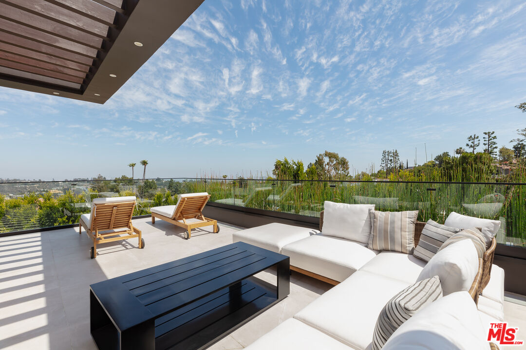 1523 Stradella Road Los Angeles, CA 90077 - Photo 40 of 54 a terrace view with sitting space and garden view