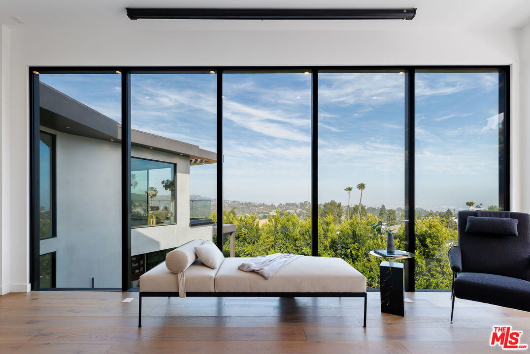 1523 Stradella Road Los Angeles, CA 90077 - Photo 41 of 54 a living room with furniture