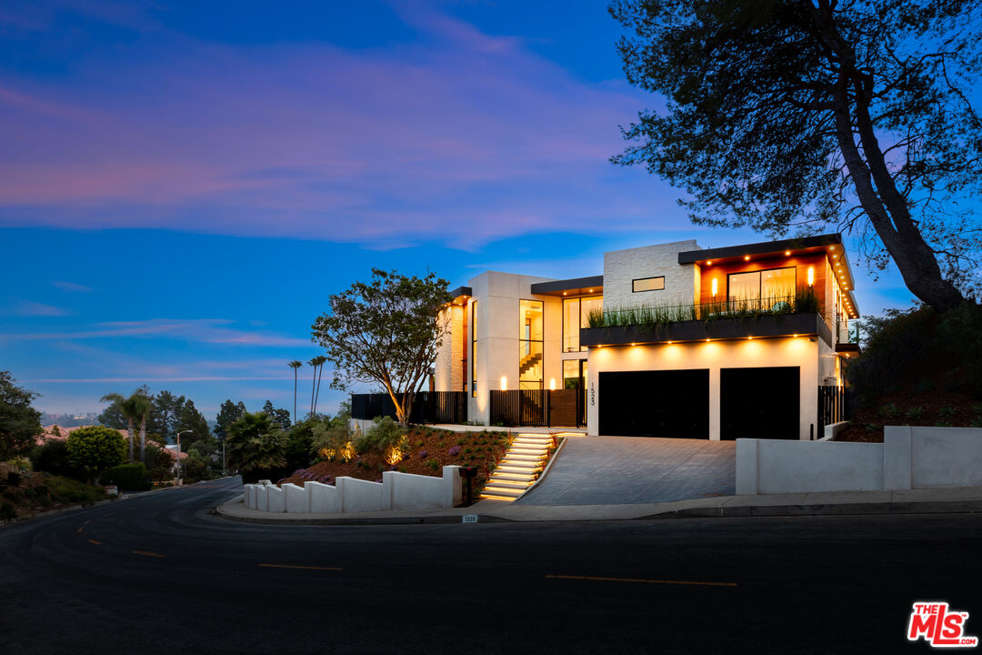 1523 Stradella Road Los Angeles, CA 90077 - Photo 54 of 54 a view of a house with a yard