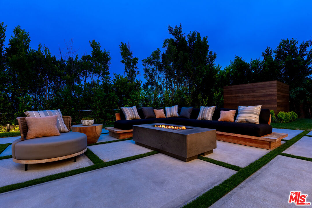 1523 Stradella Road Los Angeles, CA 90077 - Photo 10 of 54 a view of a yard with a patio