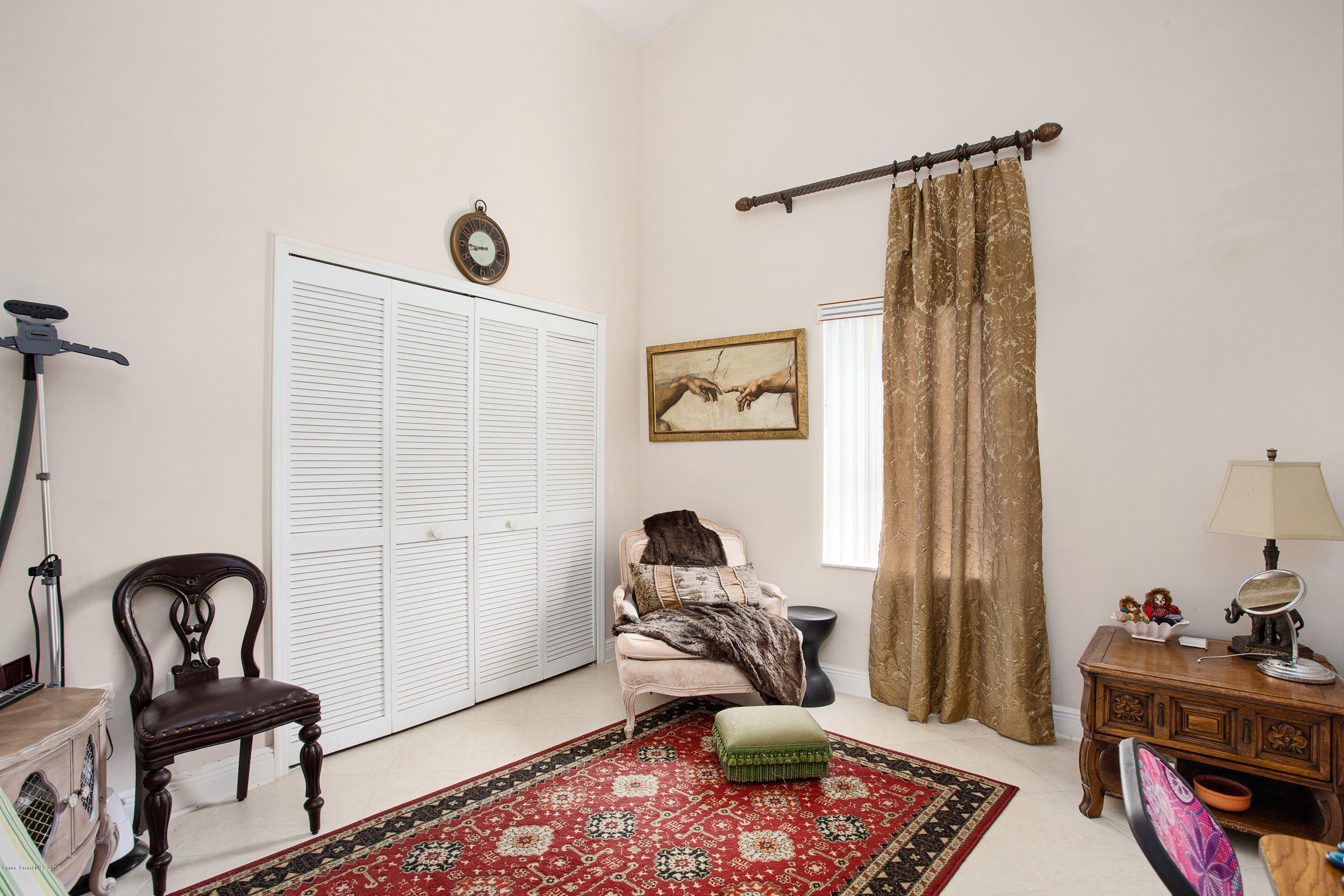 3445 Holly Springs Road Melbourne, FL 32934 - Photo 20 of 28 a living room with furniture