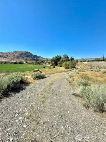 a view of an ocean and a mountain